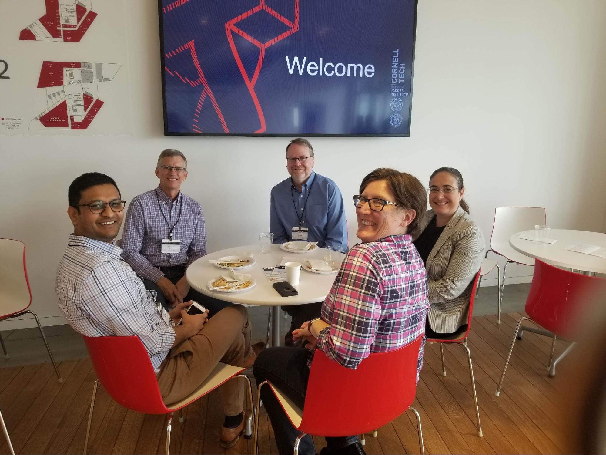 Co-director Prof. Jen Rexford meets with invited guests from the telecom industry during the morning break. Clockwise from left: Akhil Gokul (Ericsson), Larry Petersen (ONF), Ken Duell (AT&T), Raquel Morera (Verizon) and Jen Rexford (Princeton).